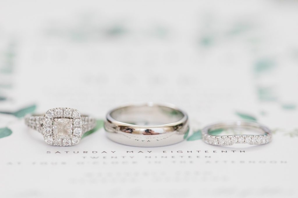 wedding rings at weatherly waterfront farm photography by costola photography