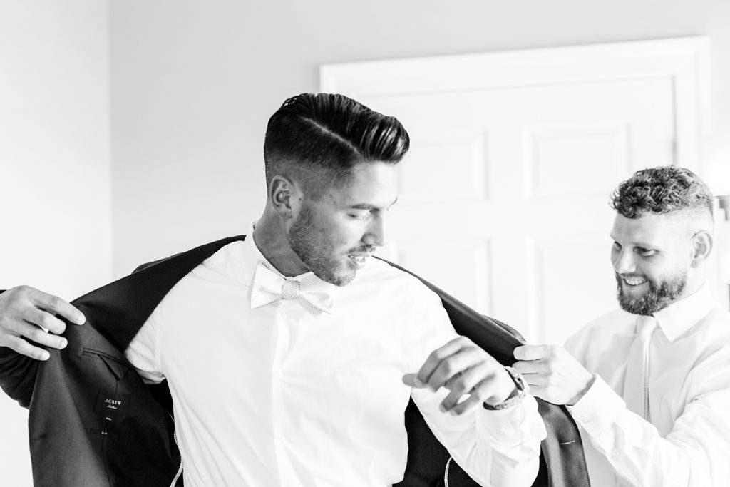 groom getting ready by costola photography