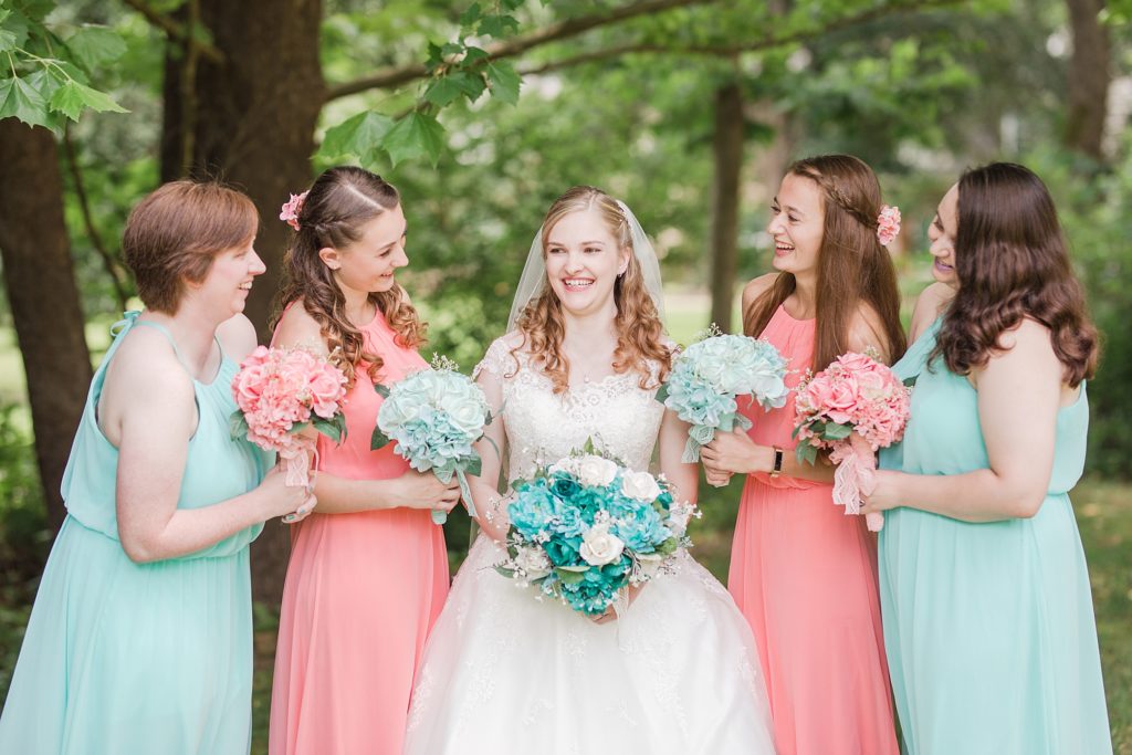 teal and coral wedding bridesmaids by Costola Photography