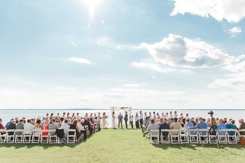 Ceremony Overlooking Water at Weatherly Farm photographed by Costola Photography