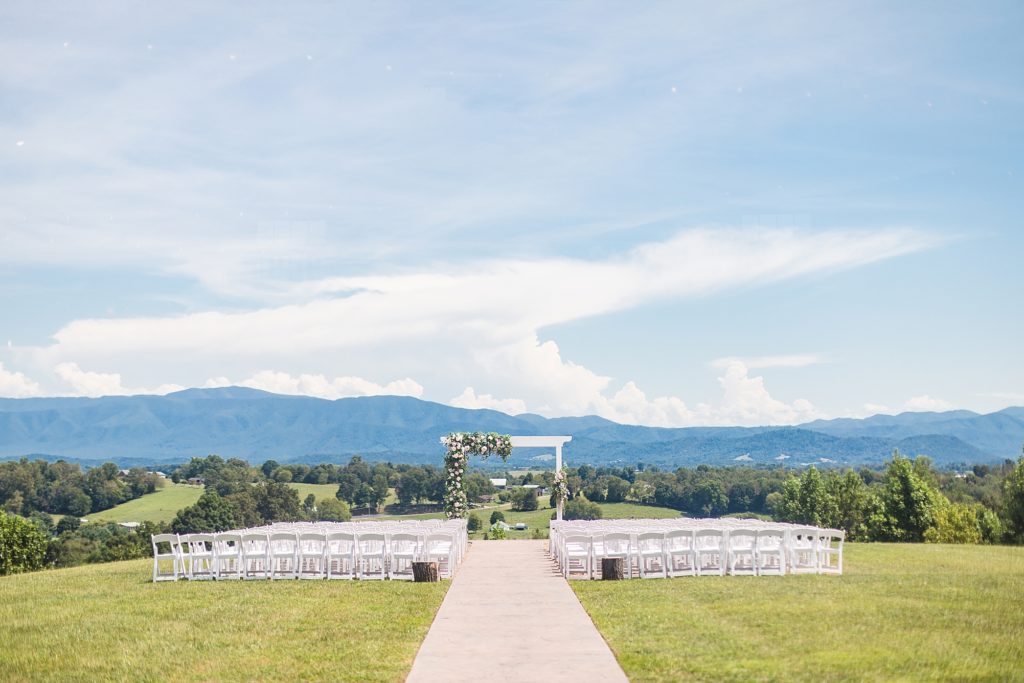 Ceremony overlooking the mountains at The Homeplace at Johnston Farm by Costola Photography