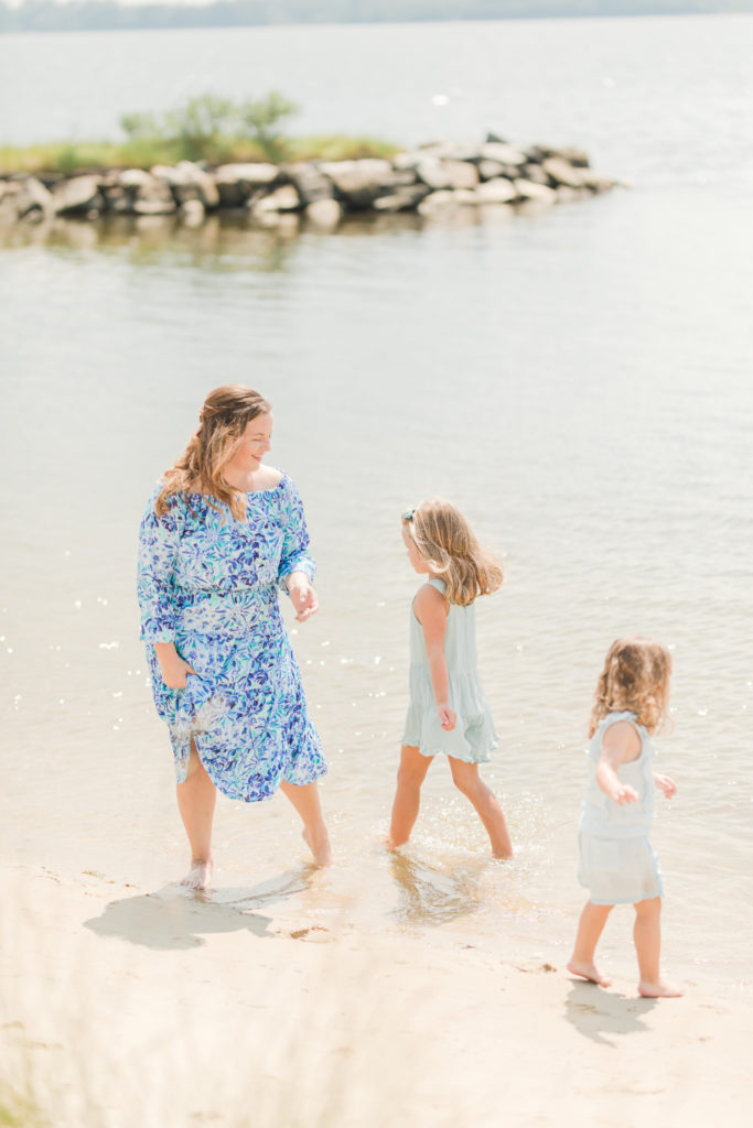 Girls playing in the water at Playful Beach Family Session in Southern Maryland by Costola Photography