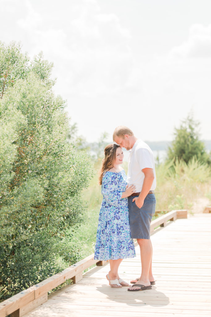 husband and wife at Playful Beach Family Session in Southern Maryland by Costola Photography