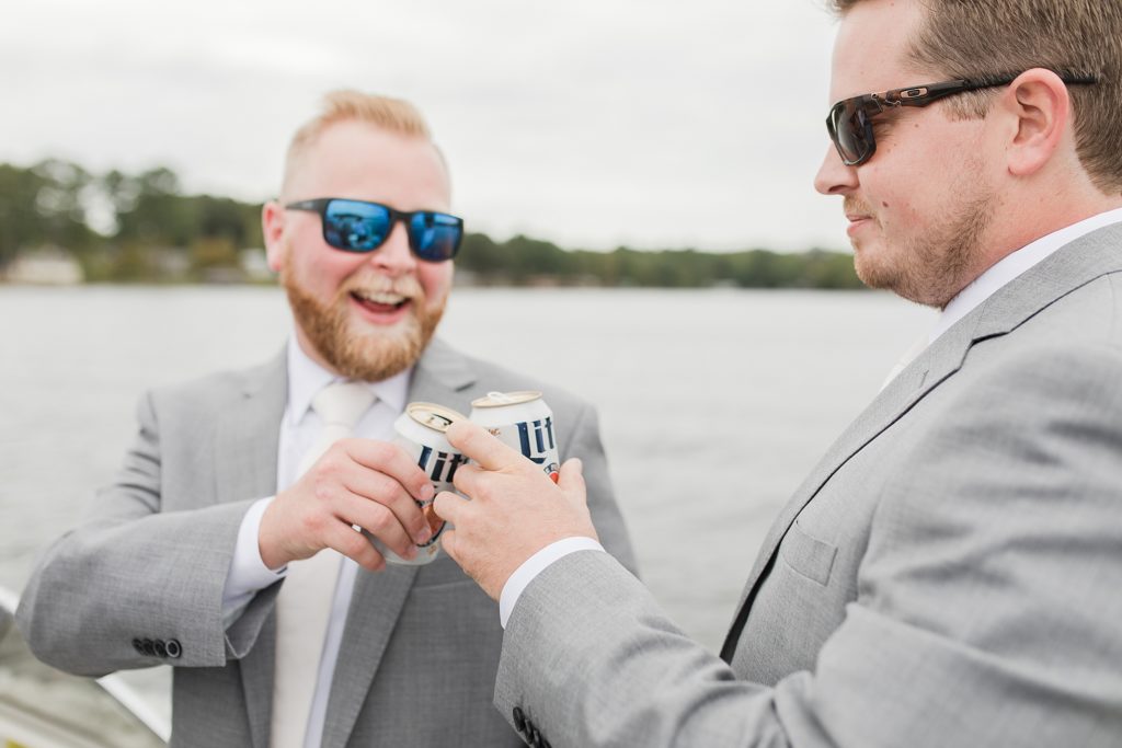 Groom traveling by boat to ceremony by Costola Photography