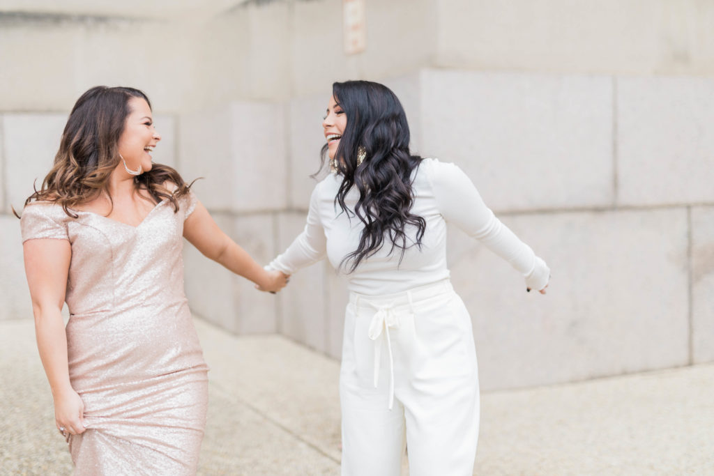2019 internship girls holding hand and dancing by costola photography