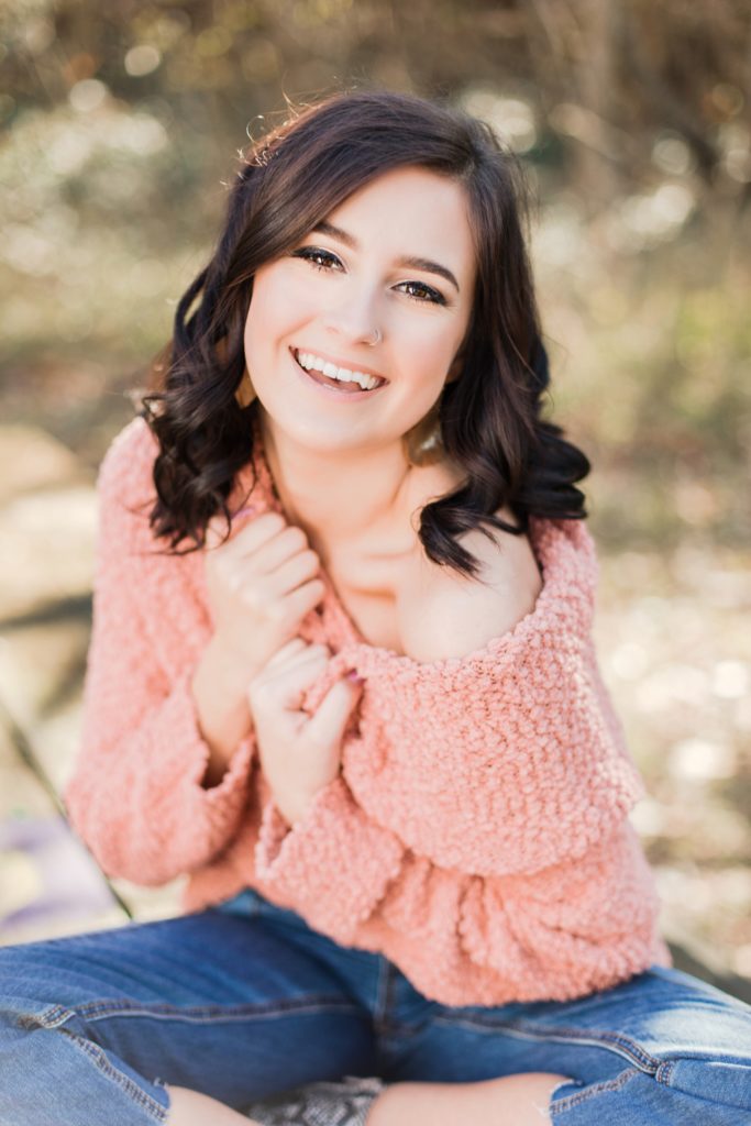 La Plata High School Senior Girl Laughing in pink sweater by Costola Photography