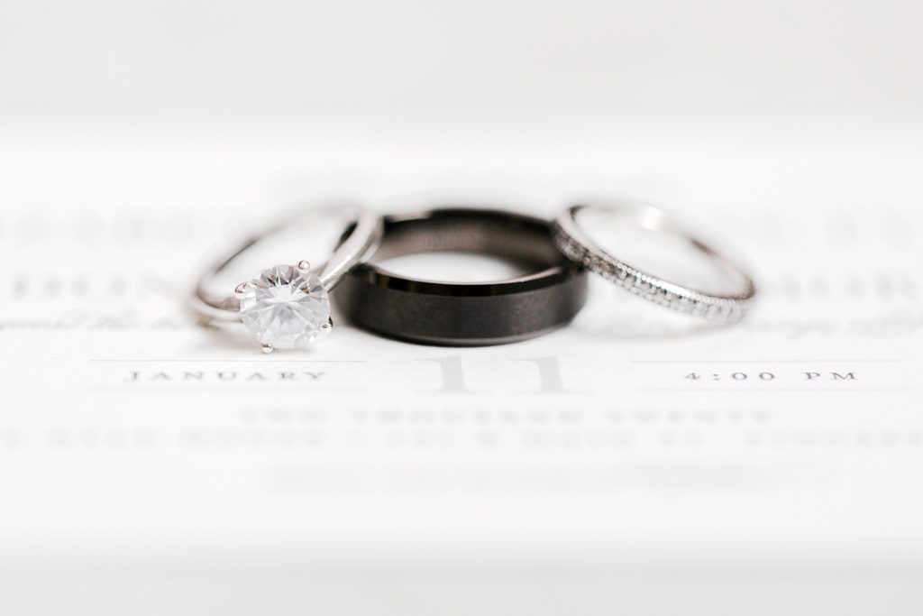 wedding rings for black and white winter wedding at the kyle house by costola photography