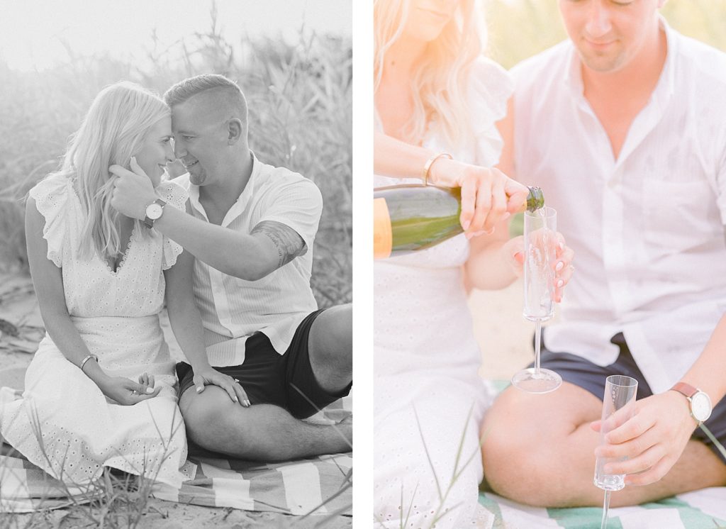Couple drinking champagne on the beach at a Romantic Eastern Shore Engagement Session by Costola Photography